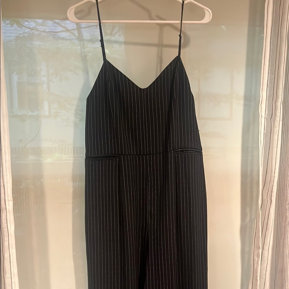 Anthropologie Black Pinstripe Jumpsuit Sleek V-Neck Design
